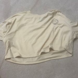 Yellow/orange crop top with smile face